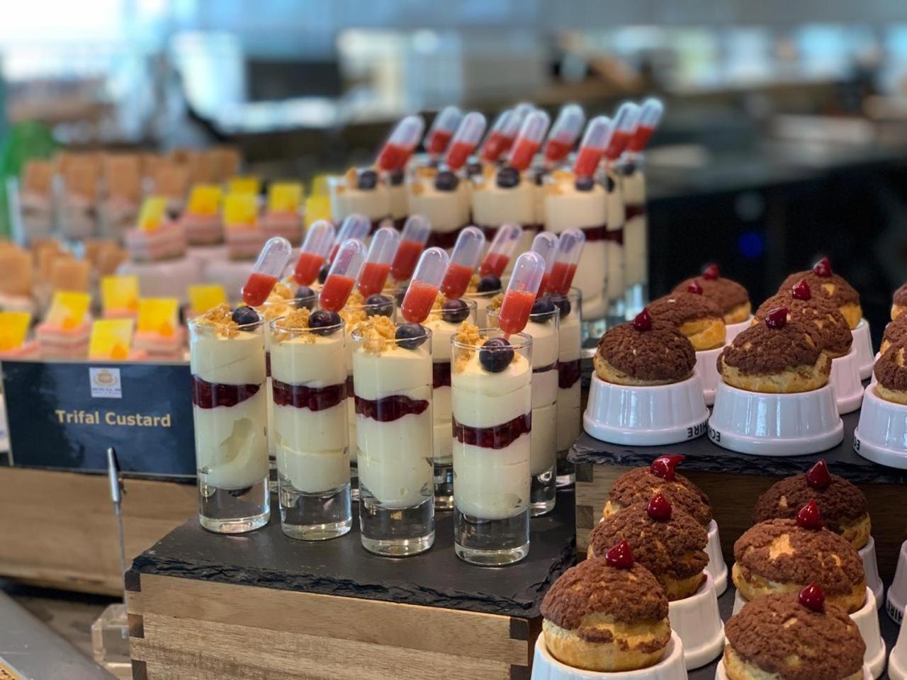Royal M Hotel Abu Dhabi By Gewan Bagian luar foto A selection of desserts
