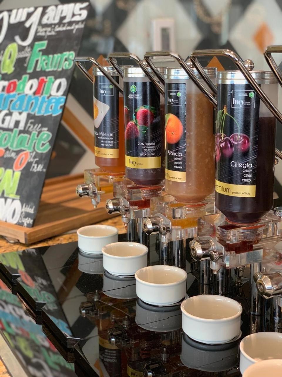 Royal M Hotel Abu Dhabi By Gewan Bagian luar foto A selection of fruit syrups