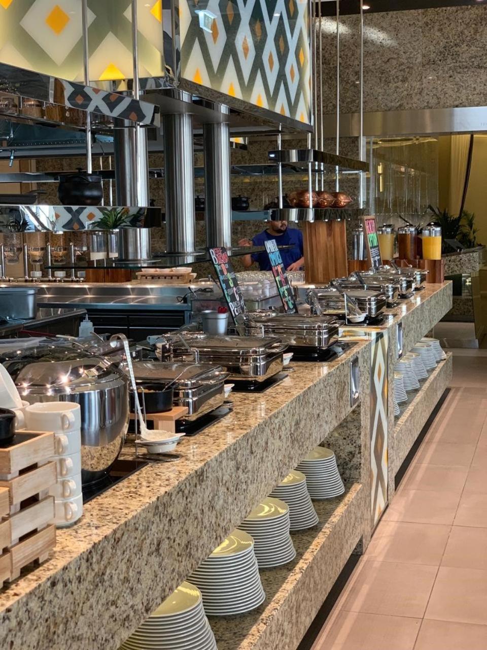 Royal M Hotel Abu Dhabi By Gewan Bagian luar foto A buffet at a hotel